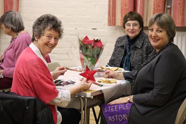 11. Merrill, Janice - Julie displaying Linda's craft items.jpg